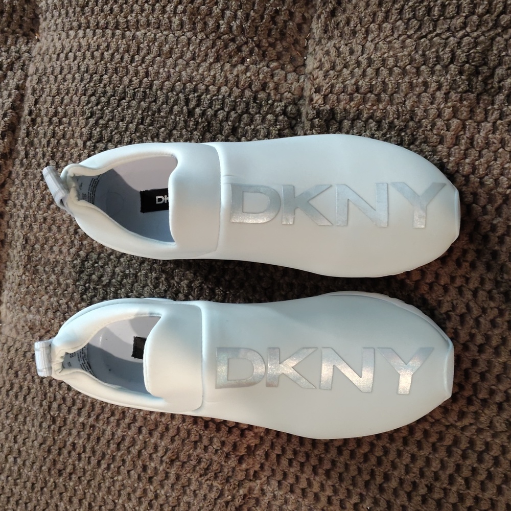 DKNY Women's White Slip-On Sneakers with Silver Logo
